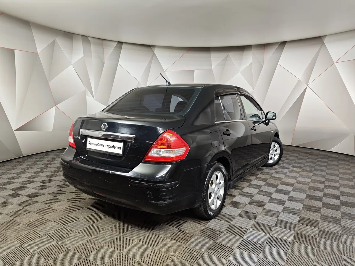 Nissan Tiida 1.6 MT (110 л.с.) Черный в АВИЛОН. Слайд №2