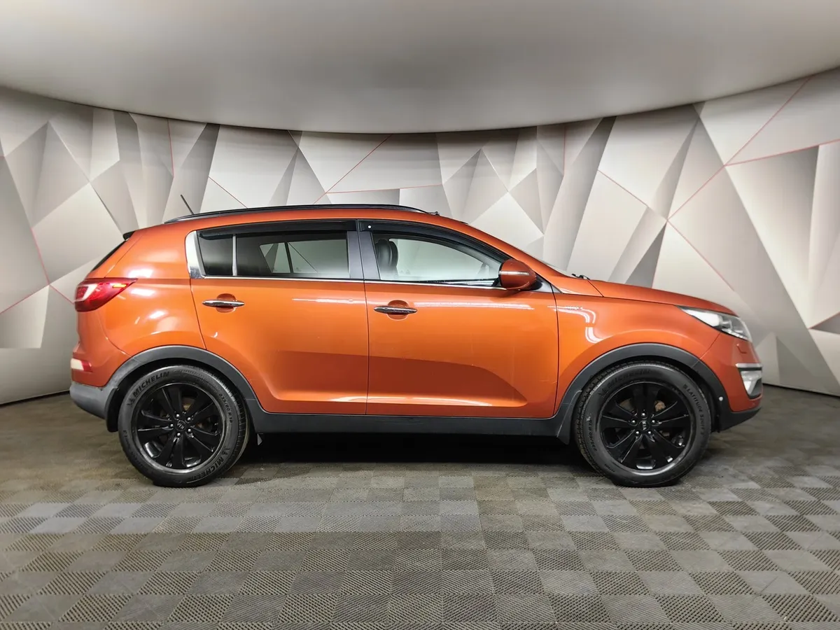 Kia Sportage 2.0 AT AWD (150 л.с.) Оранжевый в АВИЛОН. Слайд №6