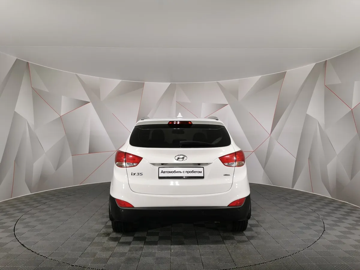 Hyundai ix35 2.0 AT 4WD (150 л.с.) Travel Белый в АВИЛОН. Слайд №8