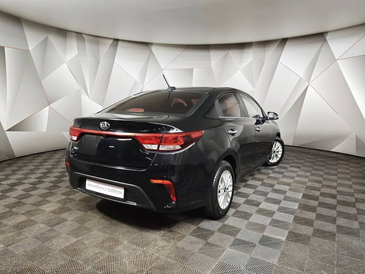 Kia Rio 1.6 AT (123 л.с.) Черный в АВИЛОН. Слайд №2