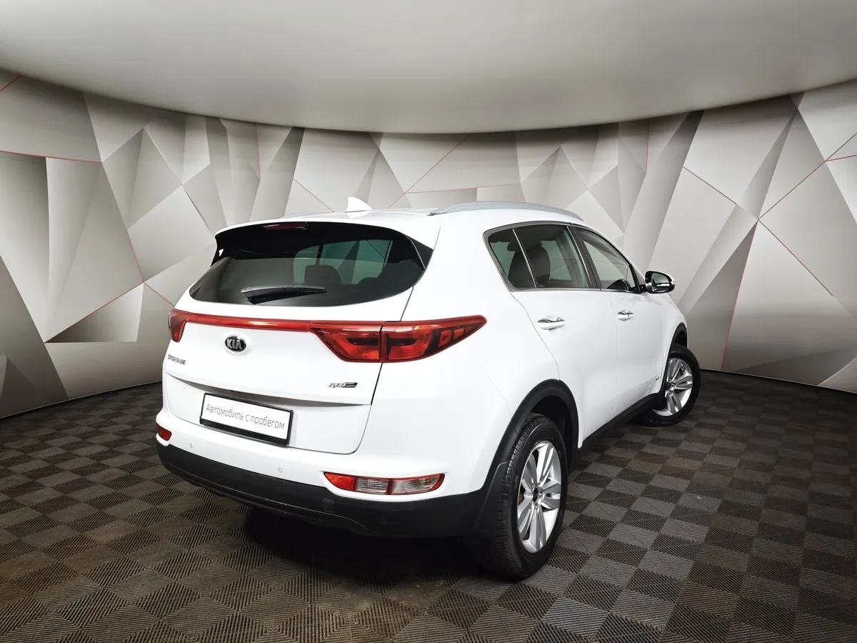Kia Sportage 2.0 AT 4WD (150 л.с.) Luxe Белый в АВИЛОН. Слайд №2