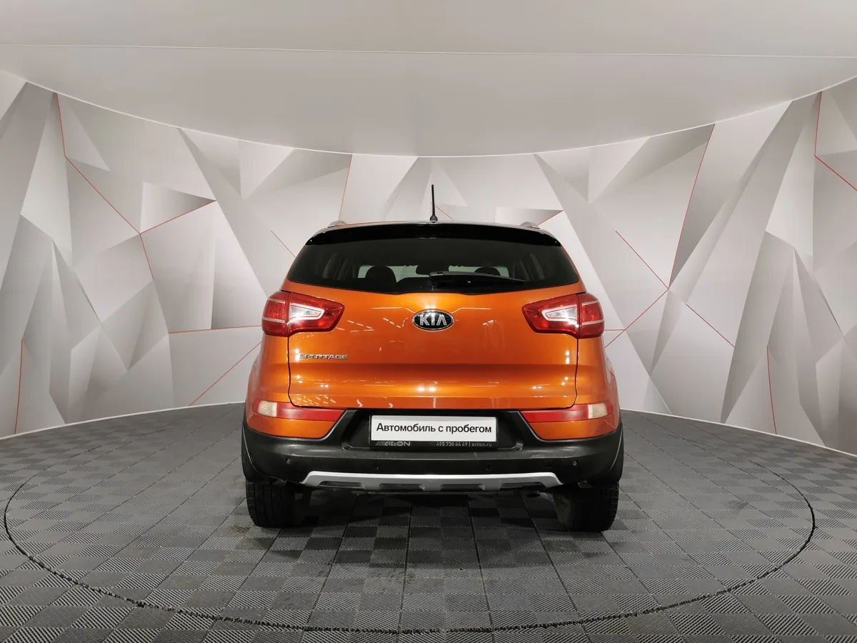 Kia Sportage 2.0 AT 4WD (150 л.с.) Luxe Оранжевый в АВИЛОН. Слайд №8