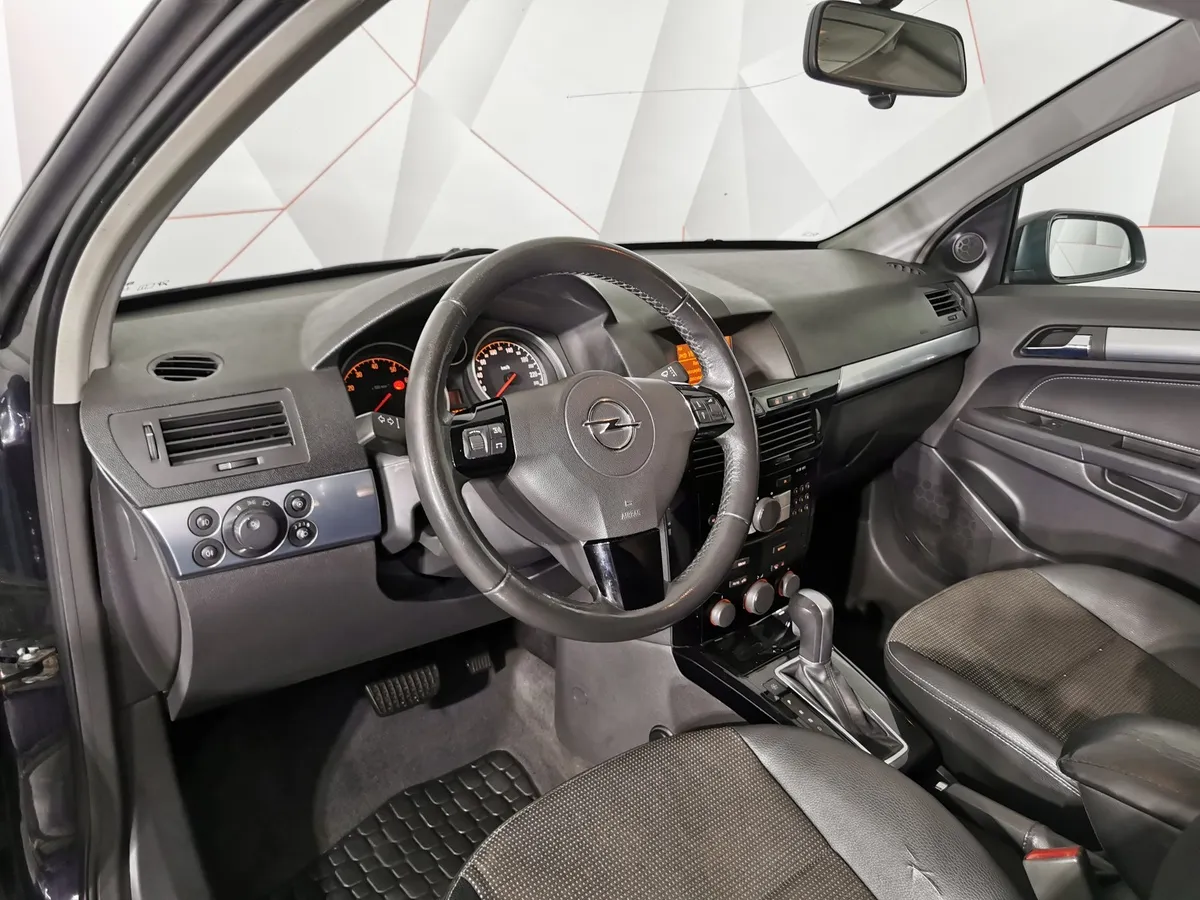 Opel Astra 1.8 AT (140 л.с.) base Черный в АВИЛОН. Слайд №18