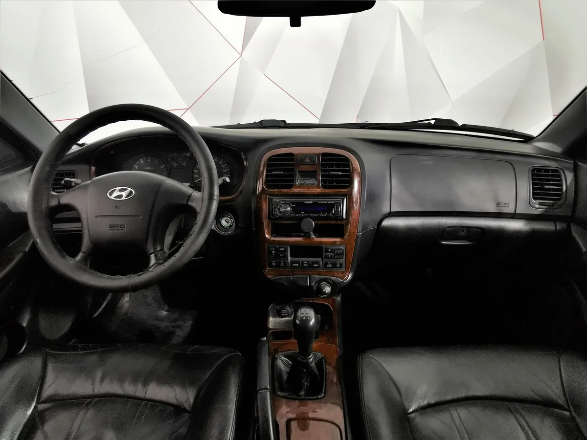 Hyundai Sonata 2.0 MT (137 л.с.) Серебристый в АВИЛОН. Слайд №12