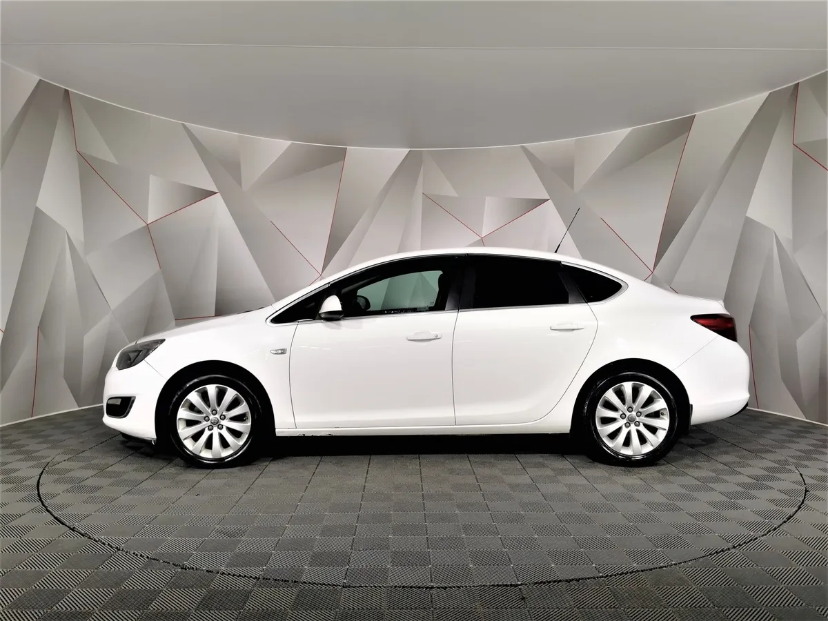 Opel Astra 1.6 AT (115 л.с.) Белый в АВИЛОН. Слайд №5