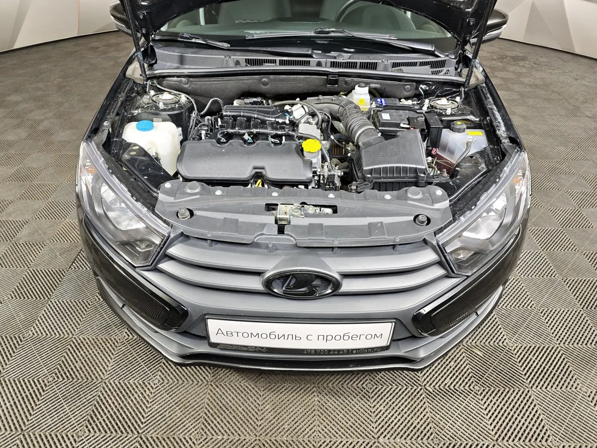 ВАЗ (Lada) Granta 1.6 MT 16кл (106 л.с.) Черный в АВИЛОН. Слайд №11