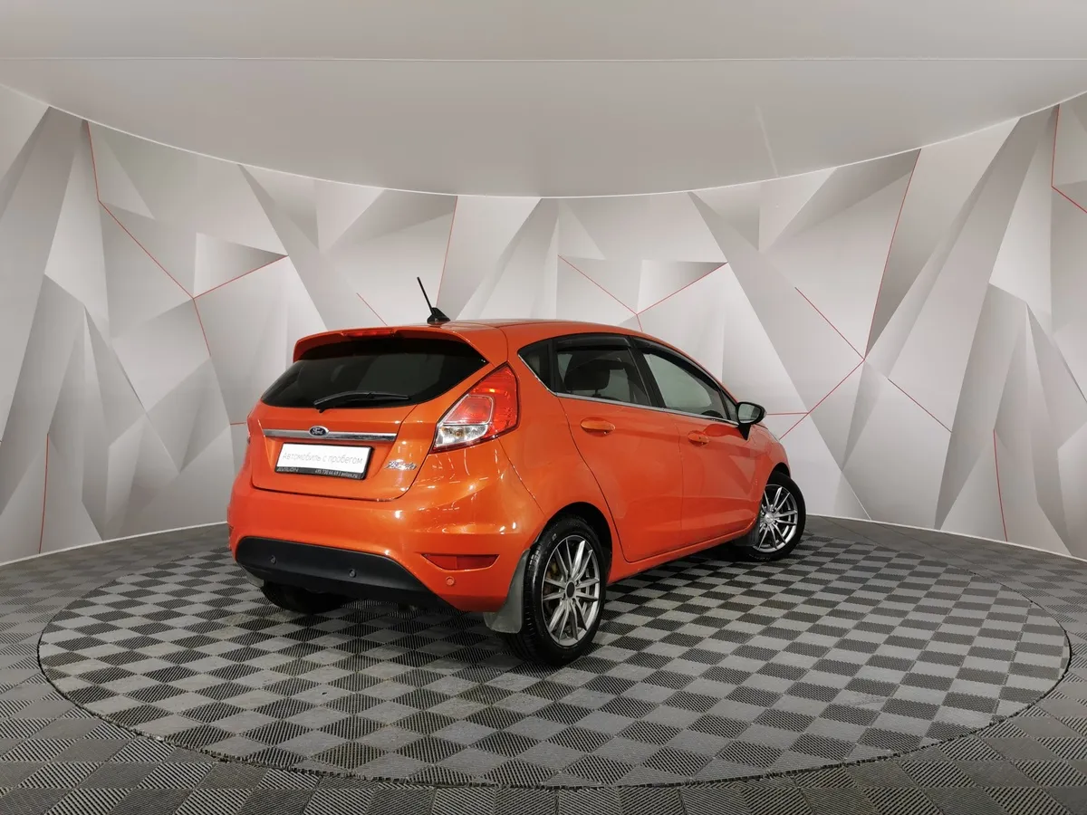 Ford Fiesta 1.4 MT (80 л.с.) Ghia Оранжевый в АВИЛОН. Слайд №2