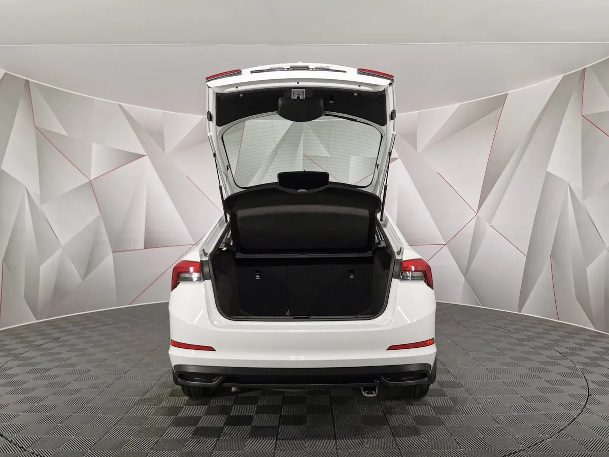 Skoda Rapid 1.6 AT (110 л.с.) Белый в АВИЛОН. Слайд №11