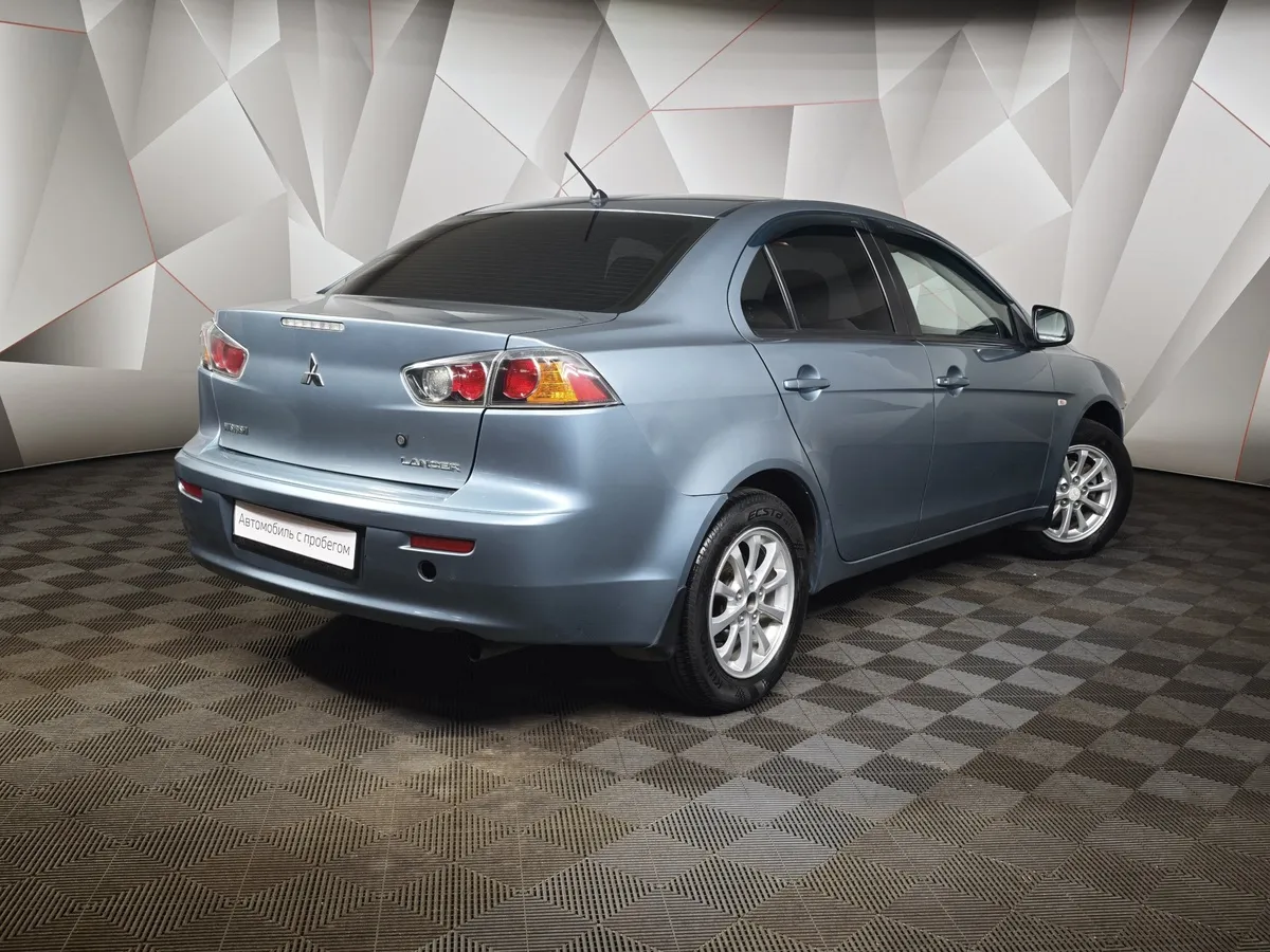 Mitsubishi Lancer 1.5 MT (109 л.с.) Зеленый в АВИЛОН. Слайд №2