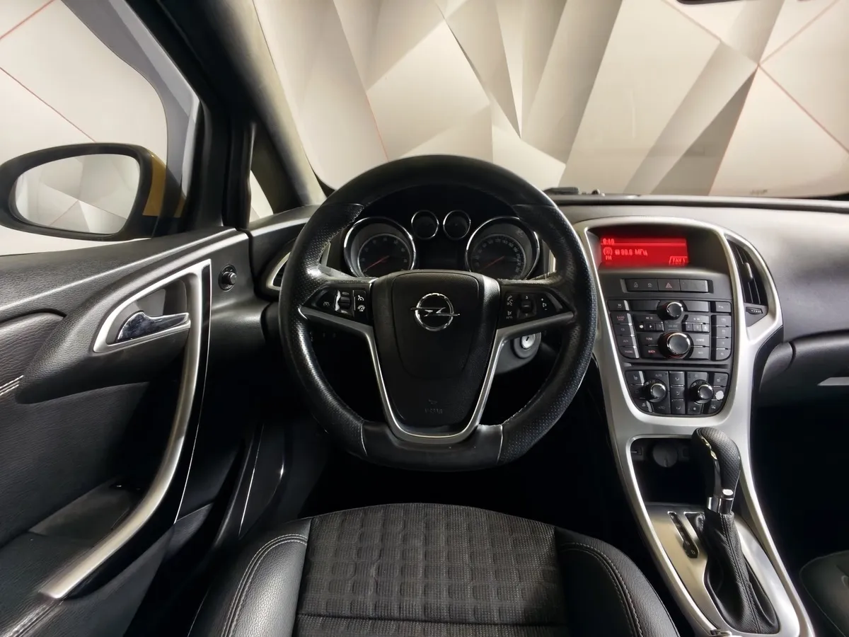 Opel Astra 1.4 Turbo AT (140 л.с.) Enjoy Желтый в АВИЛОН. Слайд №19