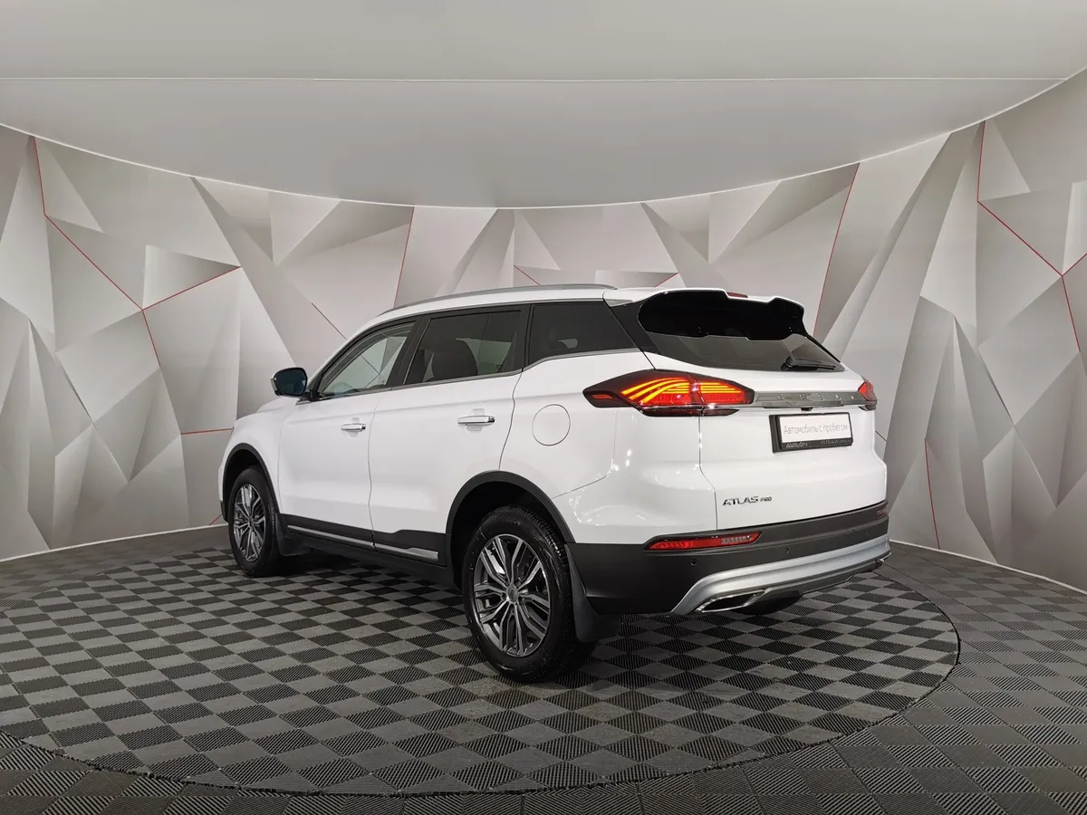 Geely Atlas Pro 1.5T AT FWD (177 л.с.) Luxury Белый в АВИЛОН. Слайд №4