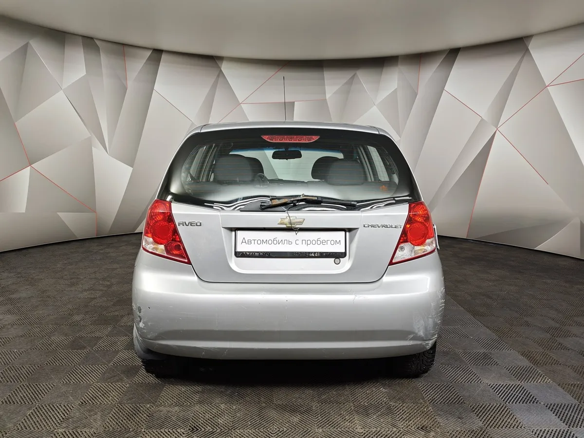 Chevrolet Aveo 1.2i MT (72 л.с.) Серебристый в АВИЛОН. Слайд №7