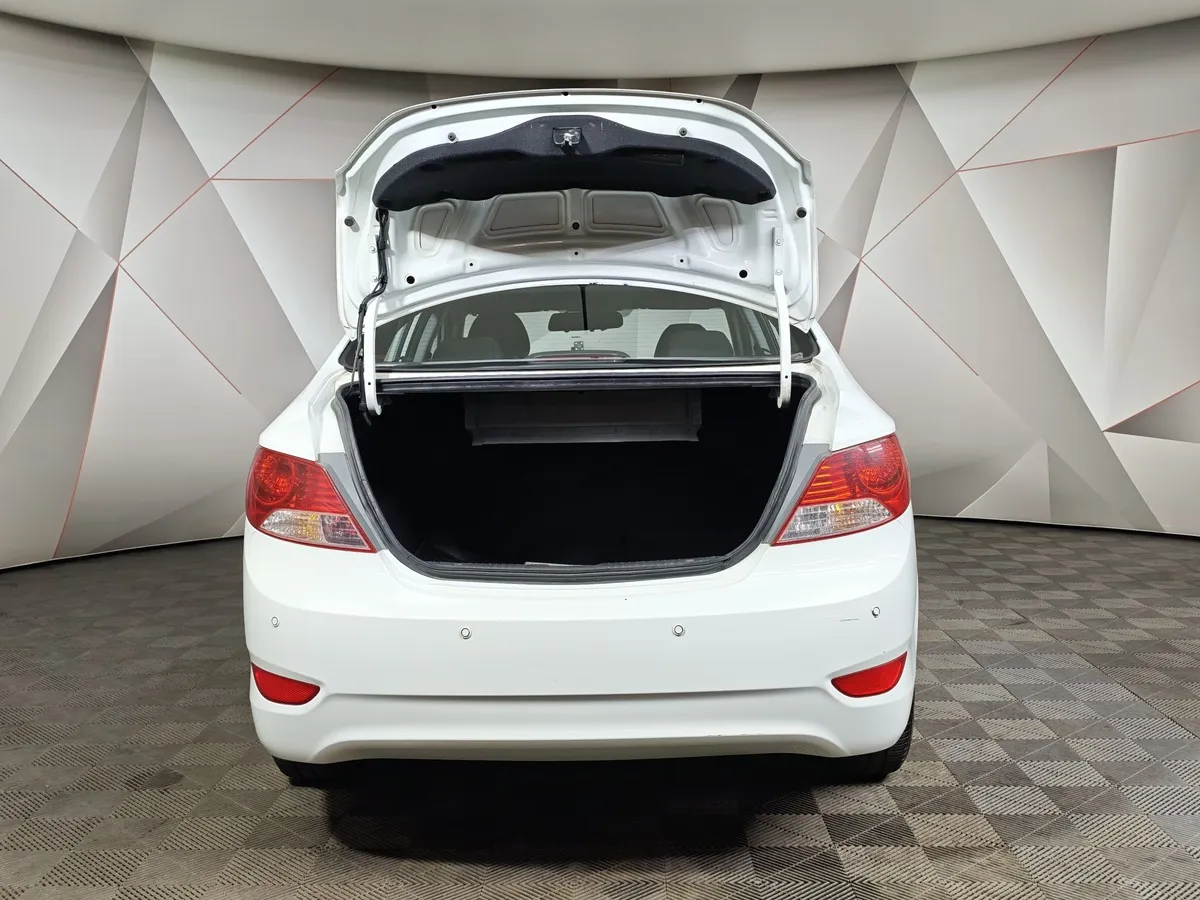 Hyundai Solaris 1.6 AT (123 л.с.) Optima Белый в АВИЛОН. Слайд №12