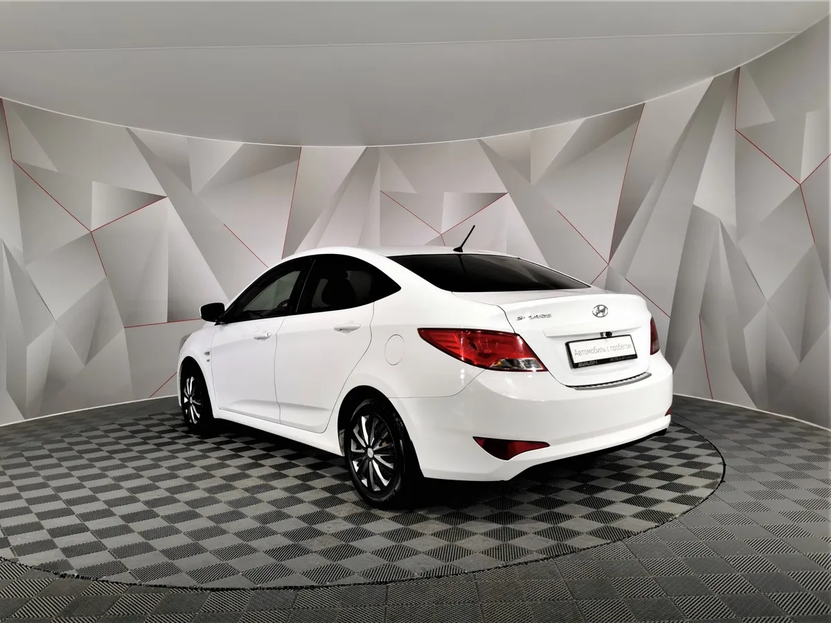 Hyundai Solaris 1.6 MT (123 л.с.) Белый в АВИЛОН. Слайд №4