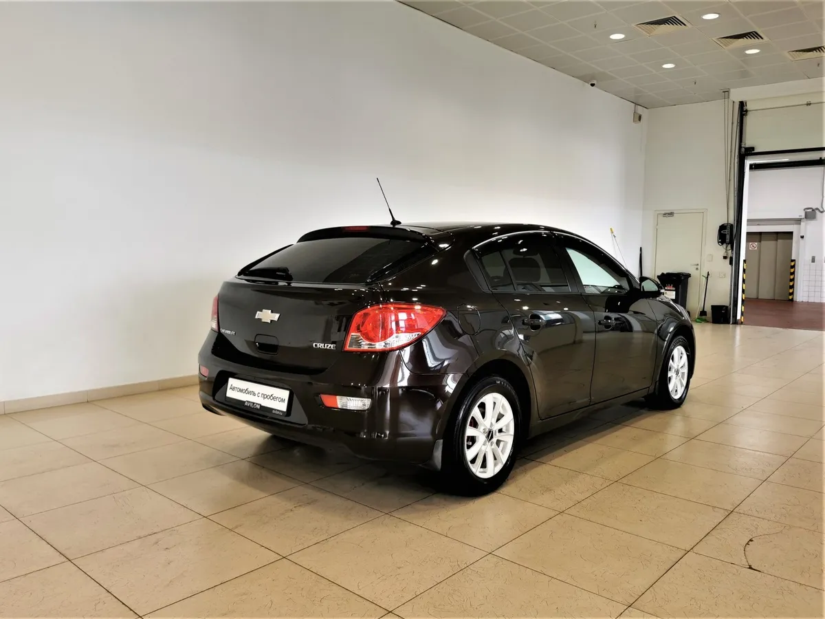 Chevrolet Cruze 1.8 MT (141 л.с.) Коричневый в АВИЛОН. Слайд №2