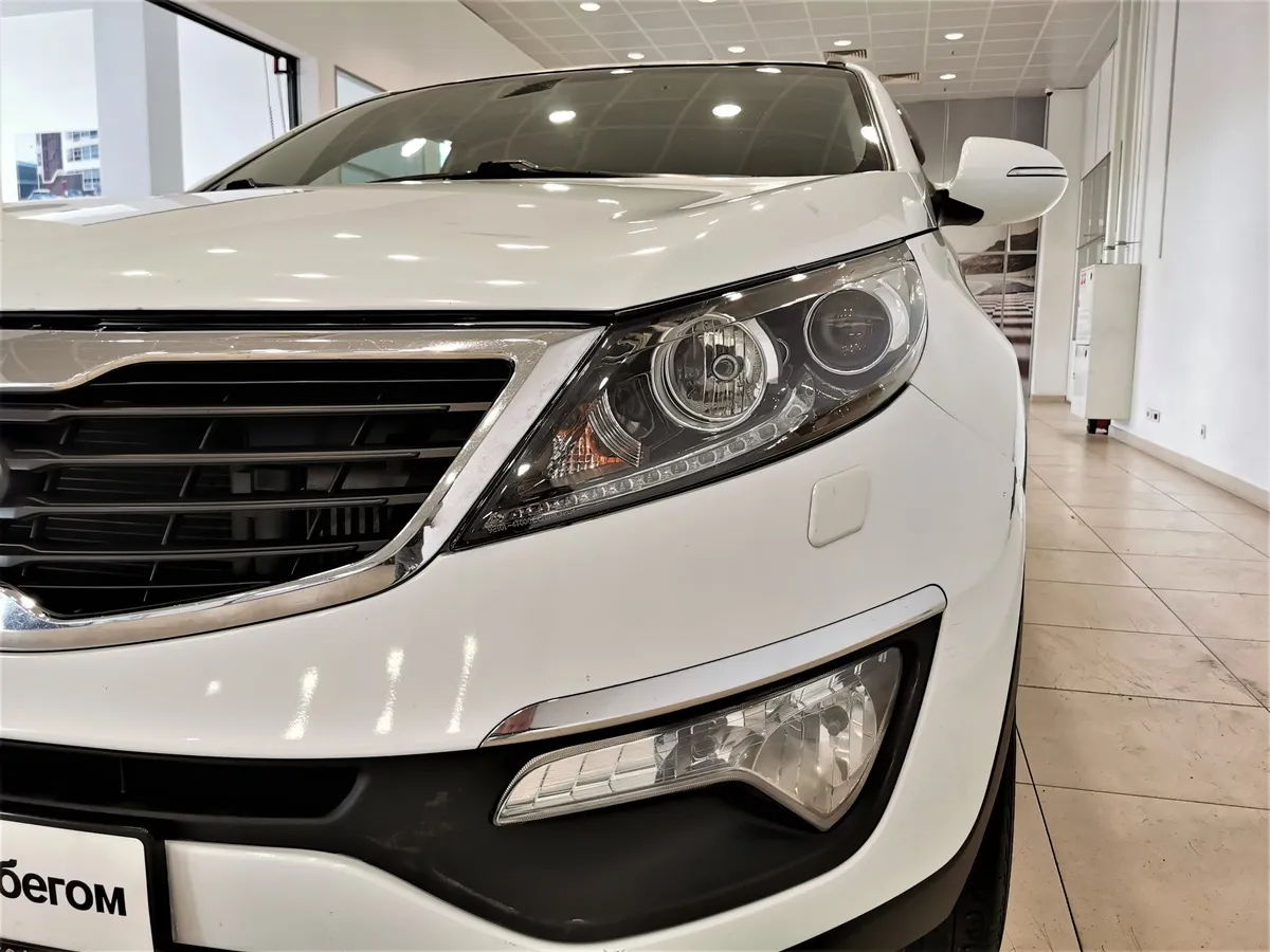Kia Sportage 2.0 TD AT 4WD (136 л.с.) Белый в АВИЛОН. Слайд №10