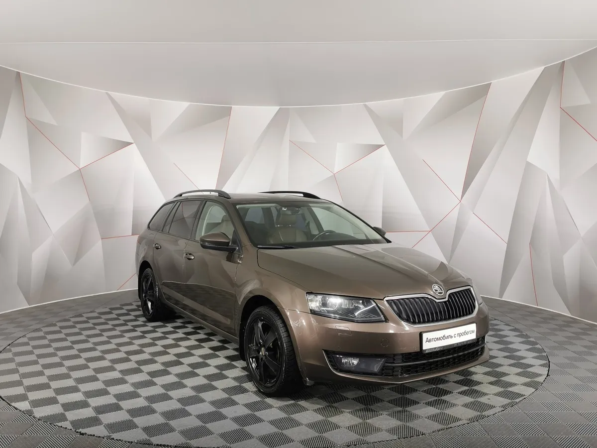 Skoda Octavia 1.8 TSI DSG 4x4 (180 л.с.) Elegance Коричневый в АВИЛОН. Слайд №3