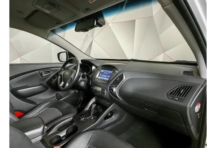Hyundai ix35 2.0 AT 4WD (150 л.с.) Comfort + Navi Белый в АВИЛОН. Слайд №12