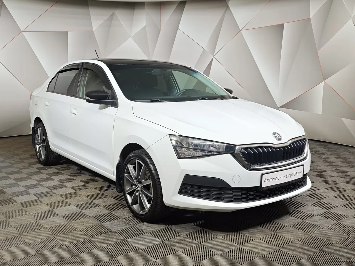 Skoda Rapid 1.6 MT (90 л.с.) Белый в АВИЛОН. Слайд №3