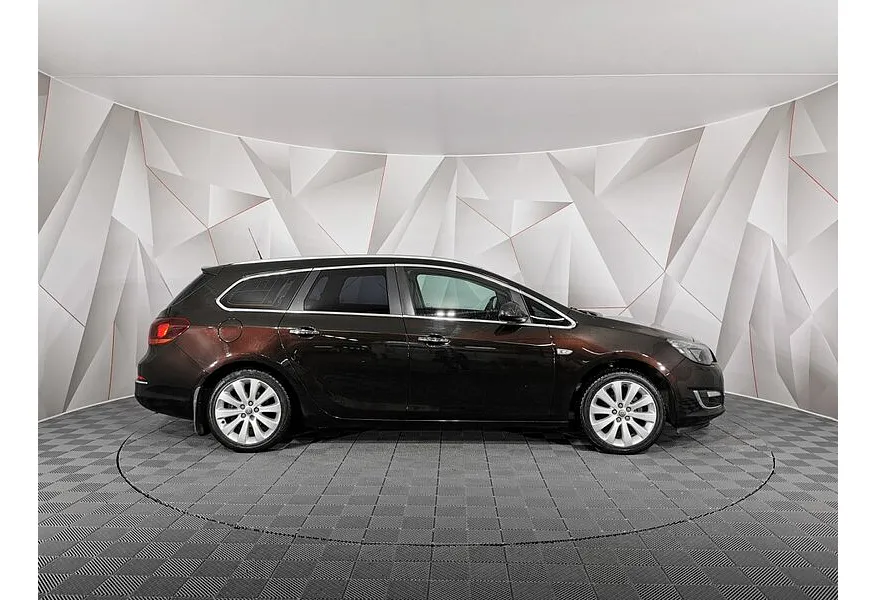 Opel Astra 1.4 Turbo AT (140 л.с.) Коричневый в АВИЛОН. Слайд №6