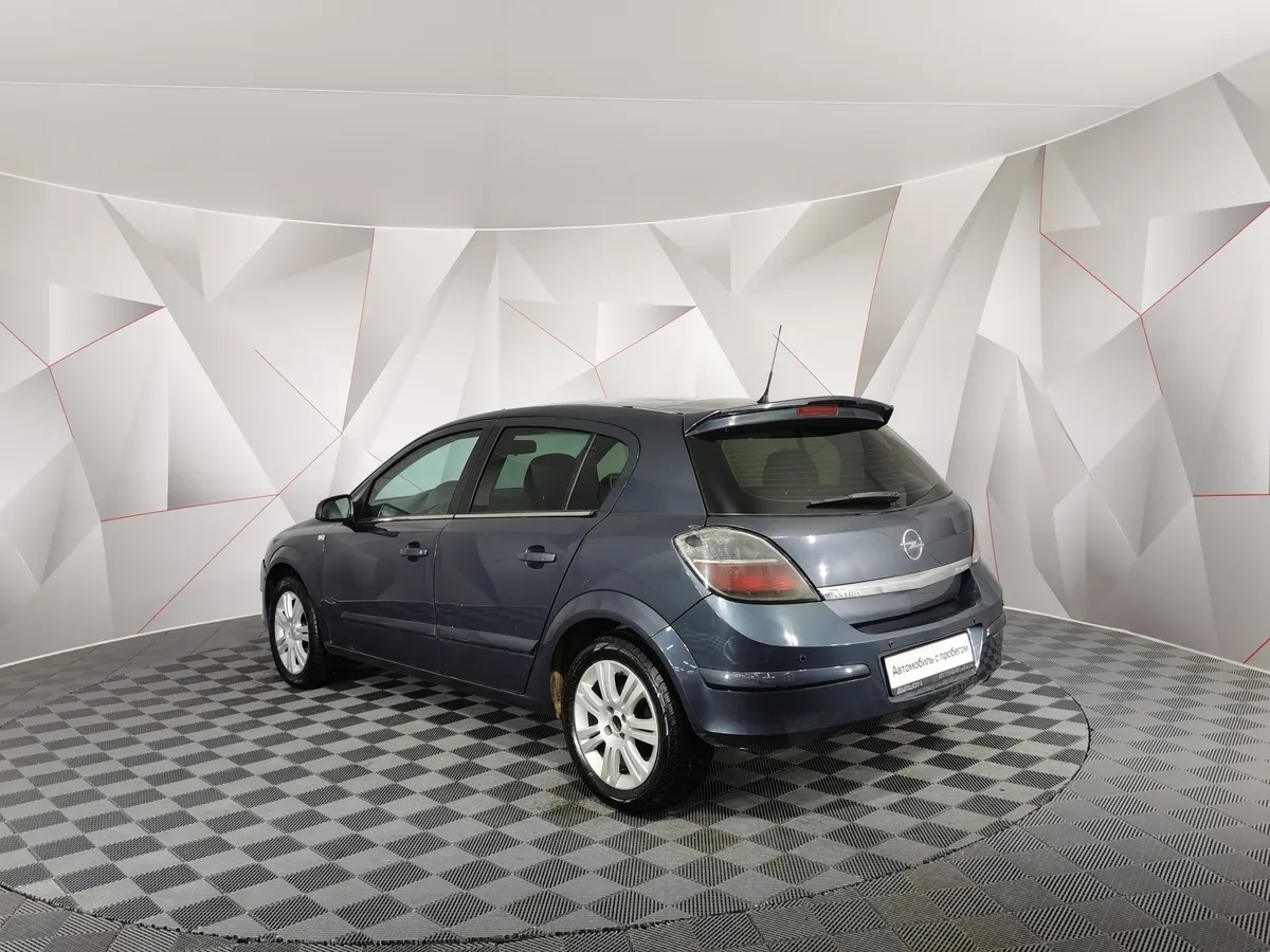 Opel Astra 1.6 MT (105 л.с.) Серый в АВИЛОН. Слайд №4