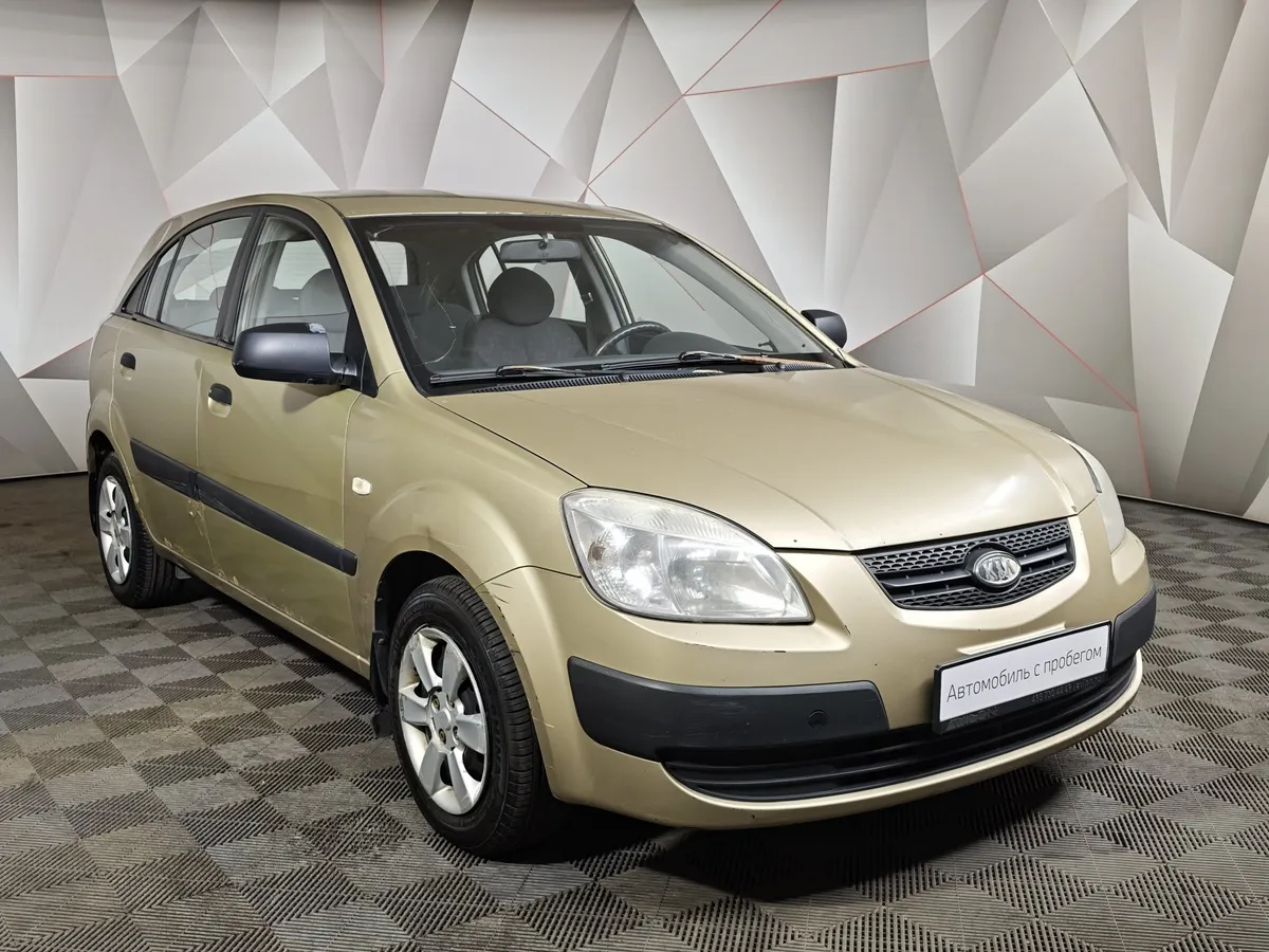 Kia Rio 1.4 MT (97 л.с.) Бежевый в АВИЛОН. Слайд №3