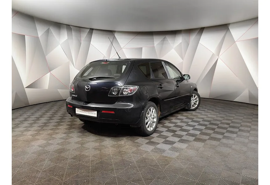 Mazda 3 1.6 AT (105 л.с.) Черный в АВИЛОН. Слайд №2
