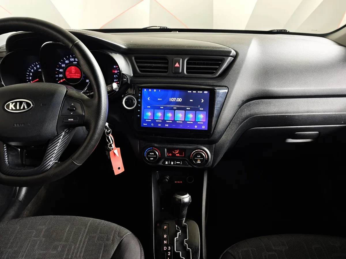 Kia Rio 1.6 AT (123 л.с.) Серый в АВИЛОН. Слайд №12