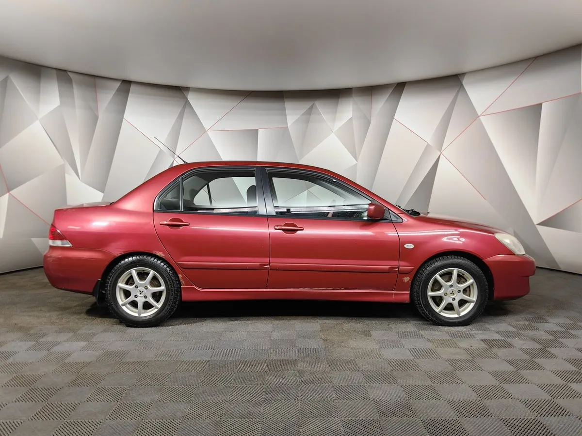 Mitsubishi Lancer 1.6 AT (98 л.с.) Красный в АВИЛОН. Слайд №6