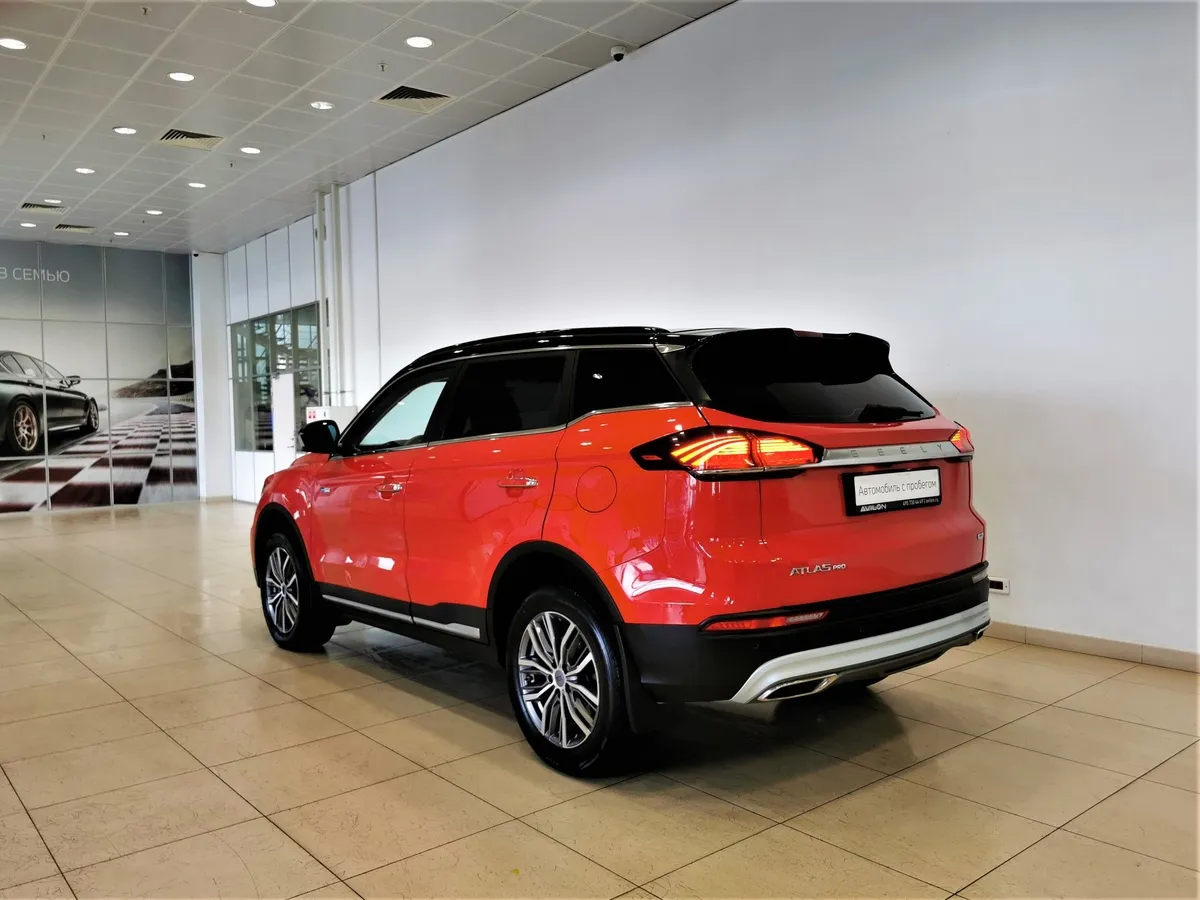 Geely Atlas Pro 1.5T 7DCT AWD (177 л.с.) Flagship Красный в АВИЛОН. Слайд №4