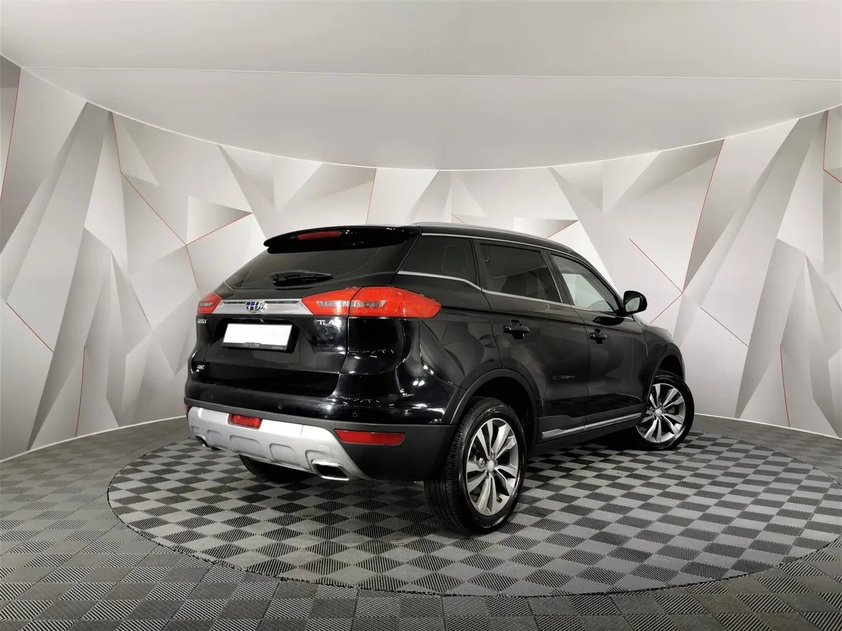 Geely Atlas 2.4 AT AWD (148 л.с.) Standard Черный в АВИЛОН. Слайд №2