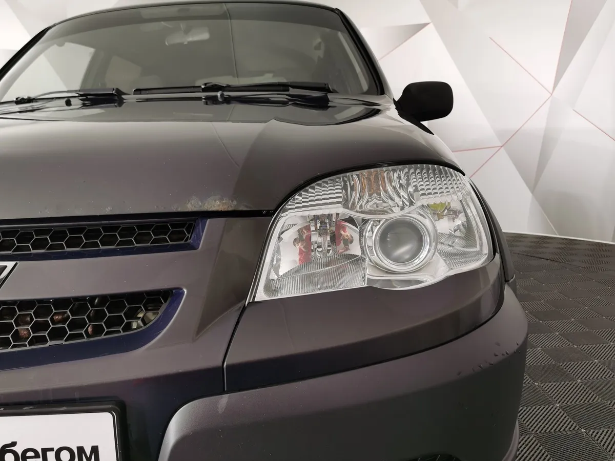 Chevrolet Niva 1.7 MT (80 л.с.) Зеленый в АВИЛОН. Слайд №10