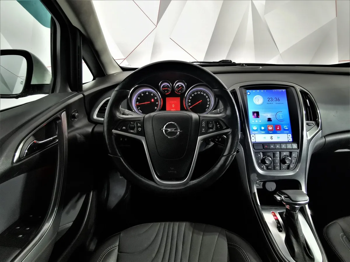 Opel Astra 1.6 AT (115 л.с.) Белый в АВИЛОН. Слайд №19