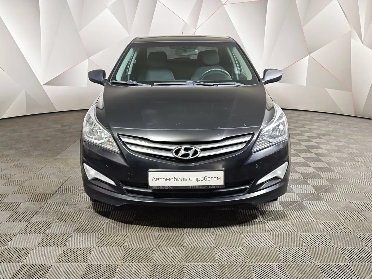 Hyundai Solaris 1.4 MT (107 л.с.) Comfort Черный в АВИЛОН. Слайд №7
