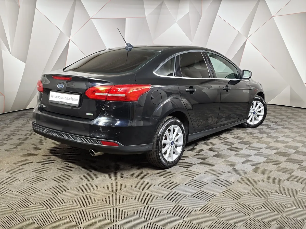Ford Focus 1.5 EcoBoost AT (150 л.с.) Titanium Черный в АВИЛОН. Слайд №2