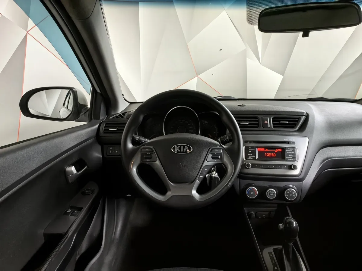 Kia Rio 1.6 AT (123 л.с.) Белый в АВИЛОН. Слайд №19