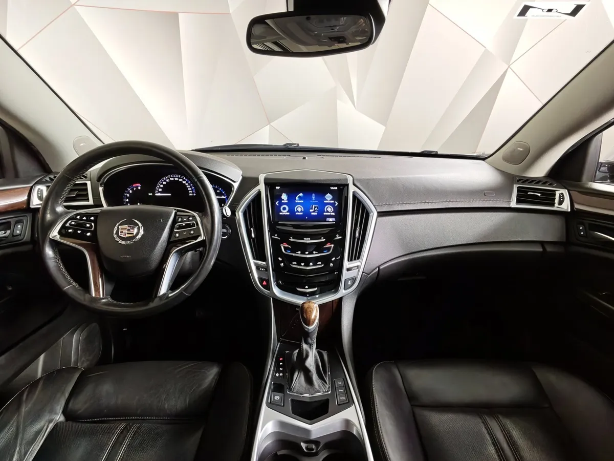 Cadillac SRX 3.6 AT AWD (318 л.с.) Белый в АВИЛОН. Слайд №12