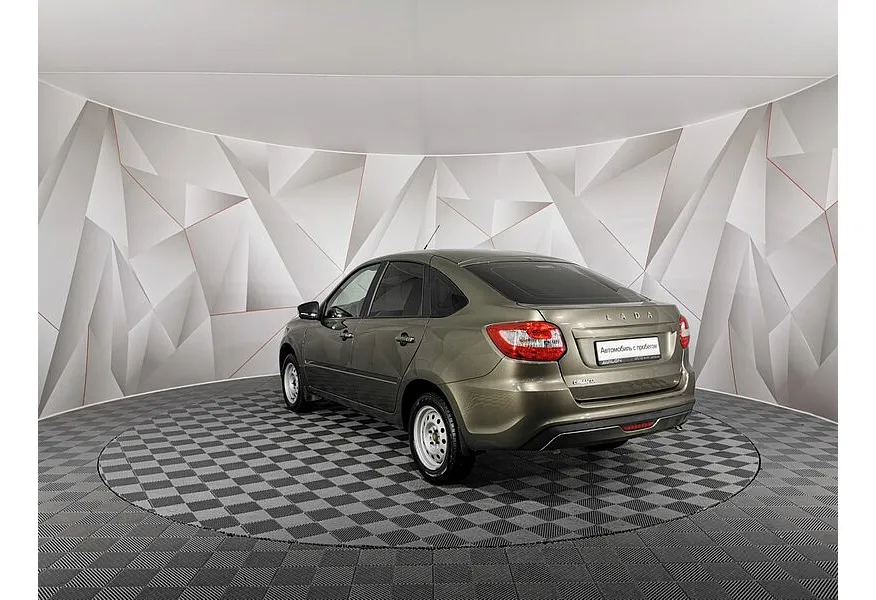 ВАЗ (Lada) Granta 1.6 MT 16 кл (106 л.с.) Коричневый в АВИЛОН. Слайд №4