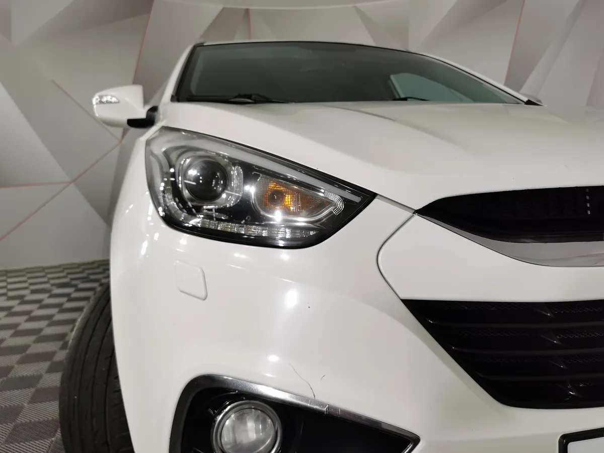 Hyundai ix35 2.0 AT 4WD (150 л.с.) Travel Белый в АВИЛОН. Слайд №10