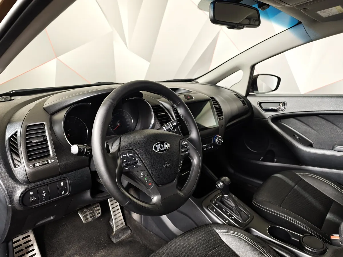 Kia Cerato 1.6 AT (130 л.с.) Коричневый в АВИЛОН. Слайд №19