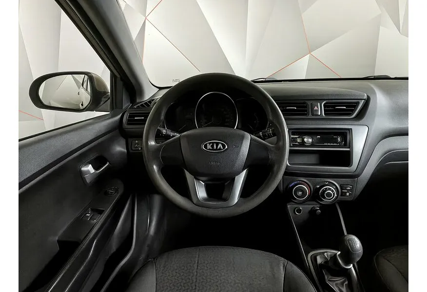 Kia Rio 1.4 MT (107 л.с.) Бежевый в АВИЛОН. Слайд №16