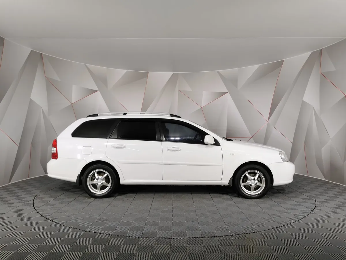 Chevrolet Lacetti 1.6 MT (109 л.с.) Белый в АВИЛОН. Слайд №6