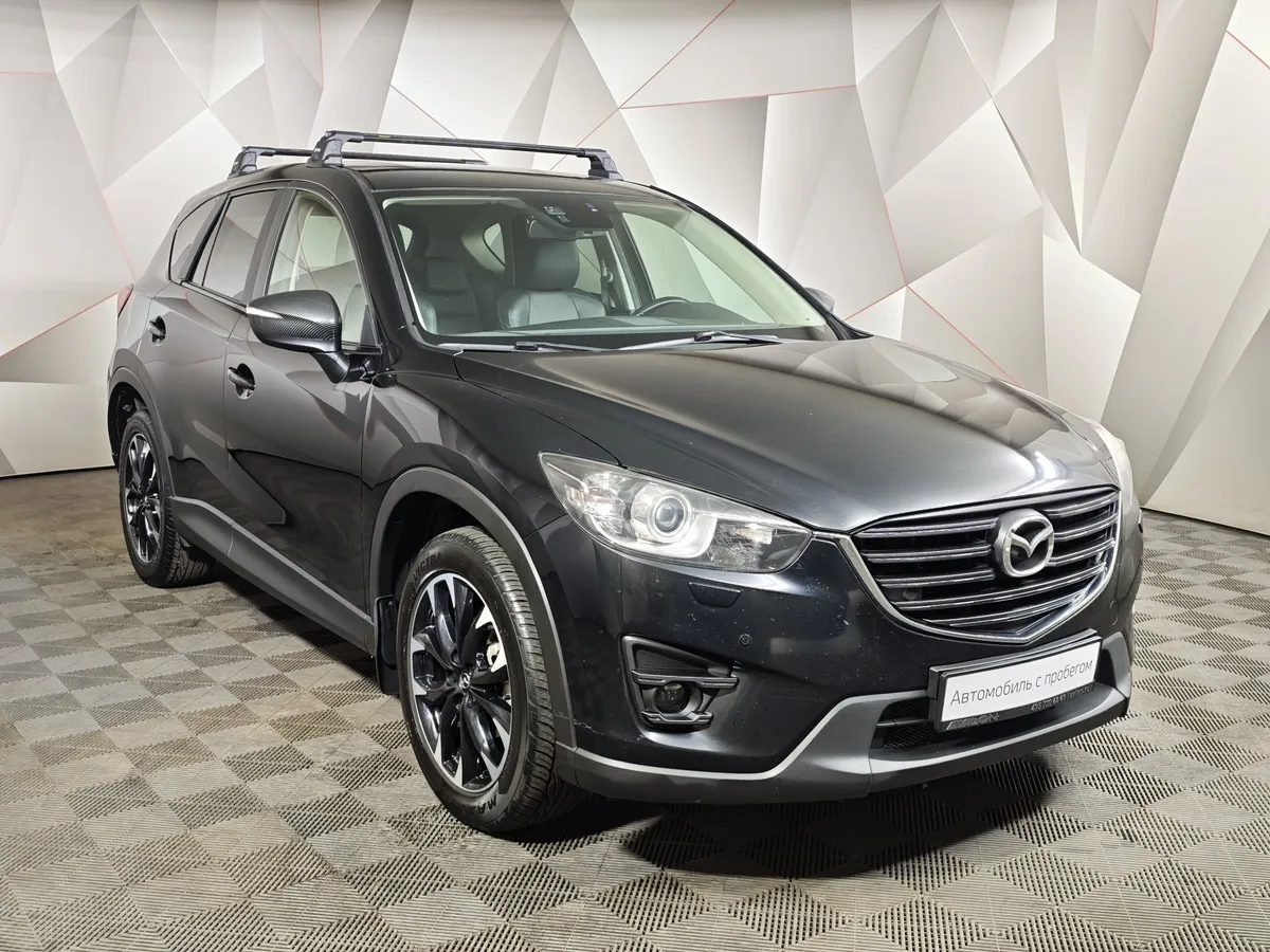 Mazda CX-5 2.0 AT 4WD (150 л.с.) Drive Черный в АВИЛОН. Слайд №3