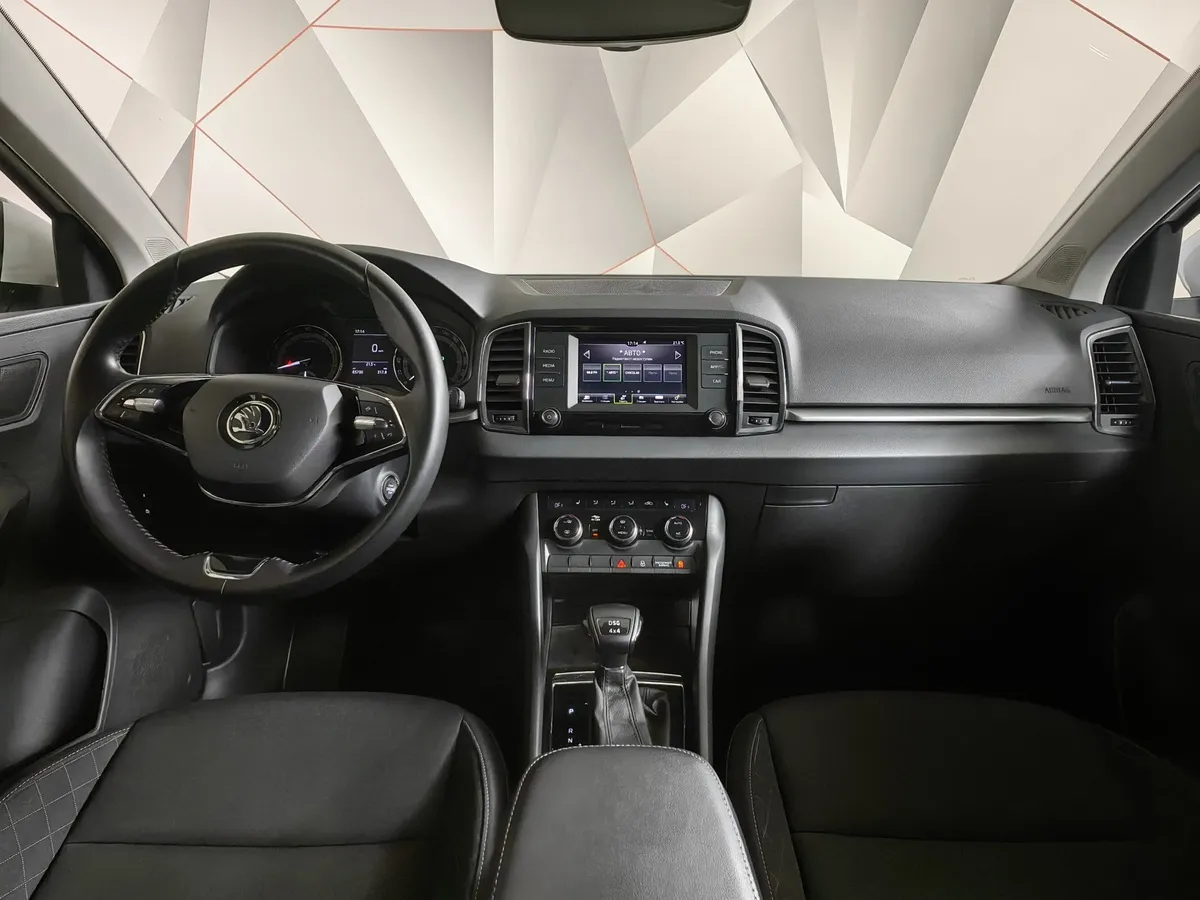 Skoda Karoq 1.4 AMT AWD (150 л.с.) Ambition Белый в АВИЛОН. Слайд №14