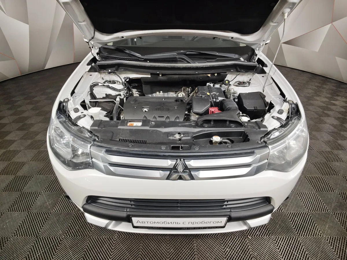 Mitsubishi Outlander 2.0 CVT 4WD (146 л.с.) Белый в АВИЛОН. Слайд №10