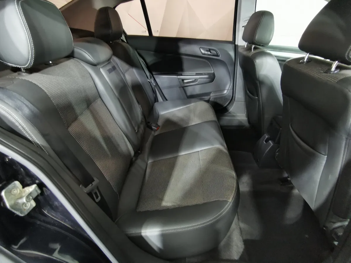Opel Astra 1.8 AT (140 л.с.) base Черный в АВИЛОН. Слайд №15