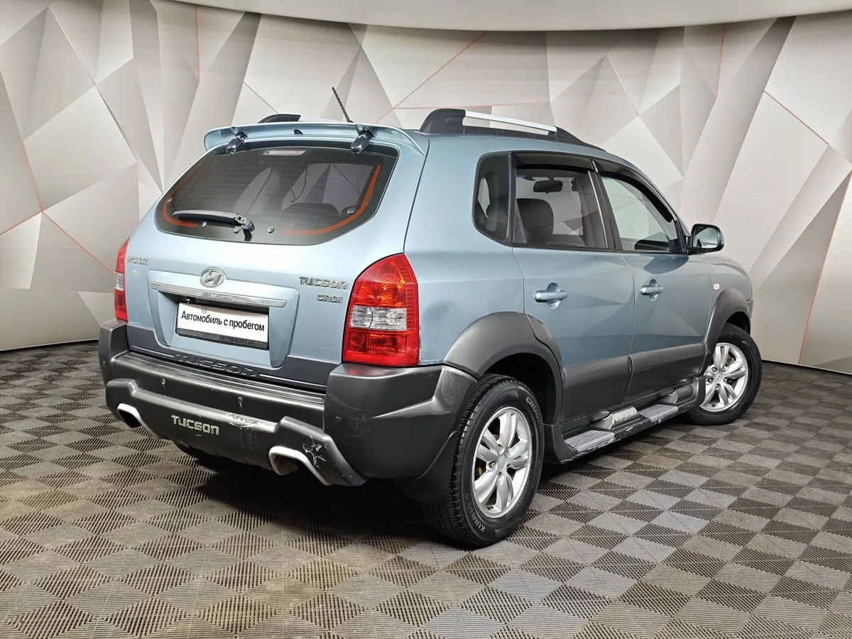 Hyundai Tucson 2.0 CRDI AT 2WD (112 л.с.) Голубой в АВИЛОН. Слайд №2