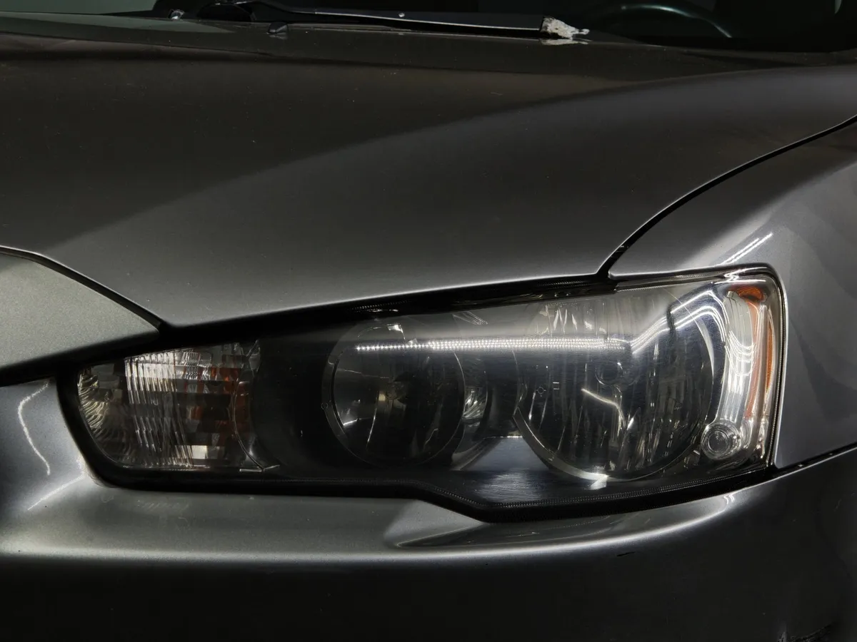 Mitsubishi Lancer 1.6 AT (117 л.с.) Серый в АВИЛОН. Слайд №10