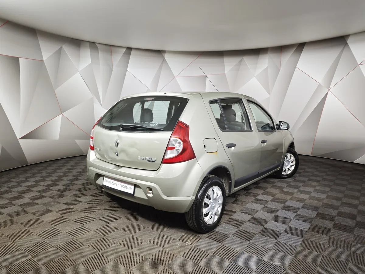 Renault Sandero 1.6 MT (84 л.с.) Коричневый в АВИЛОН. Слайд №2