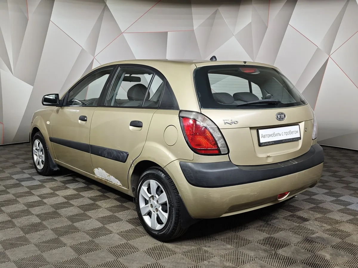 Kia Rio 1.4 MT (97 л.с.) Бежевый в АВИЛОН. Слайд №4